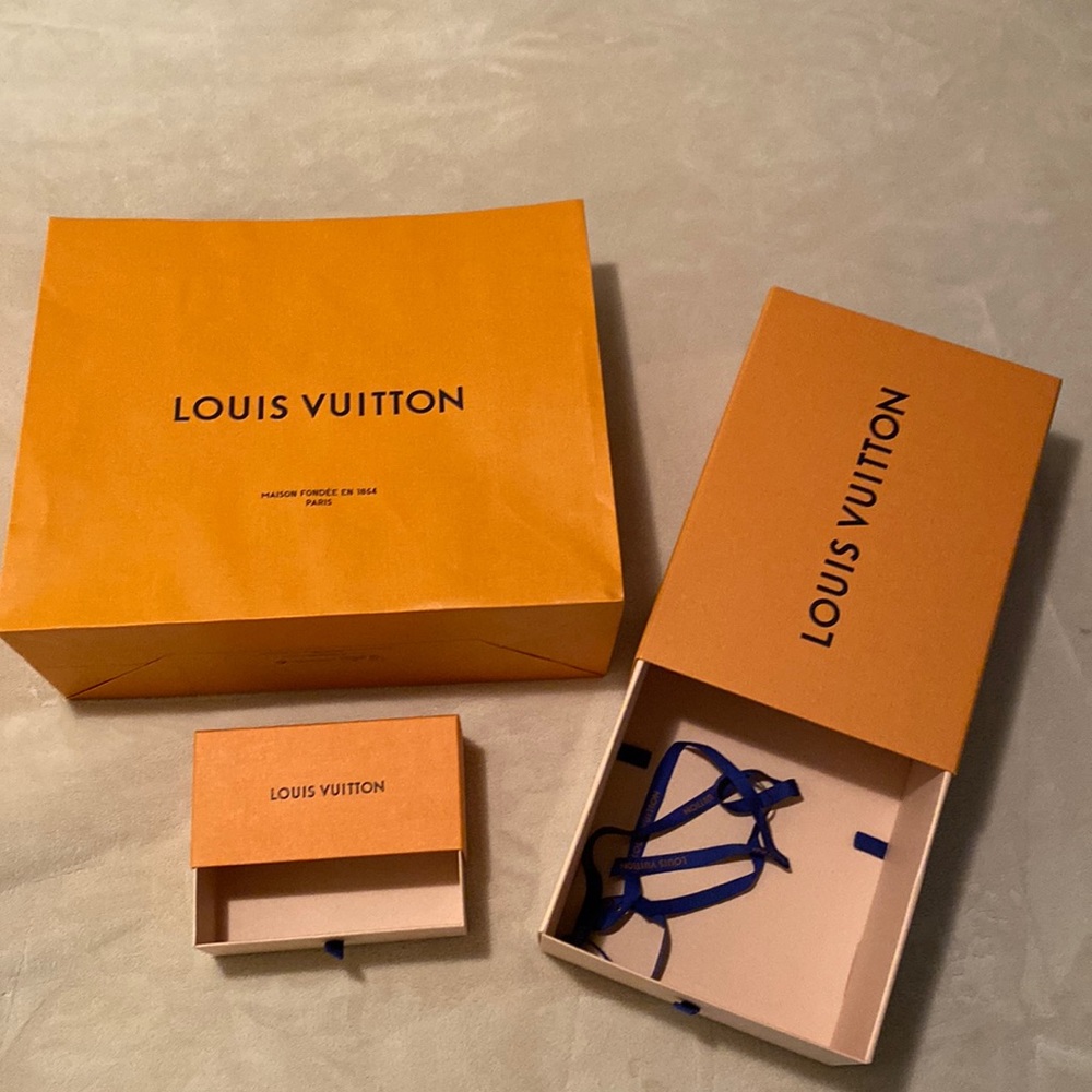 Authentic Louis Vuitton large size bag and medium and small size box.